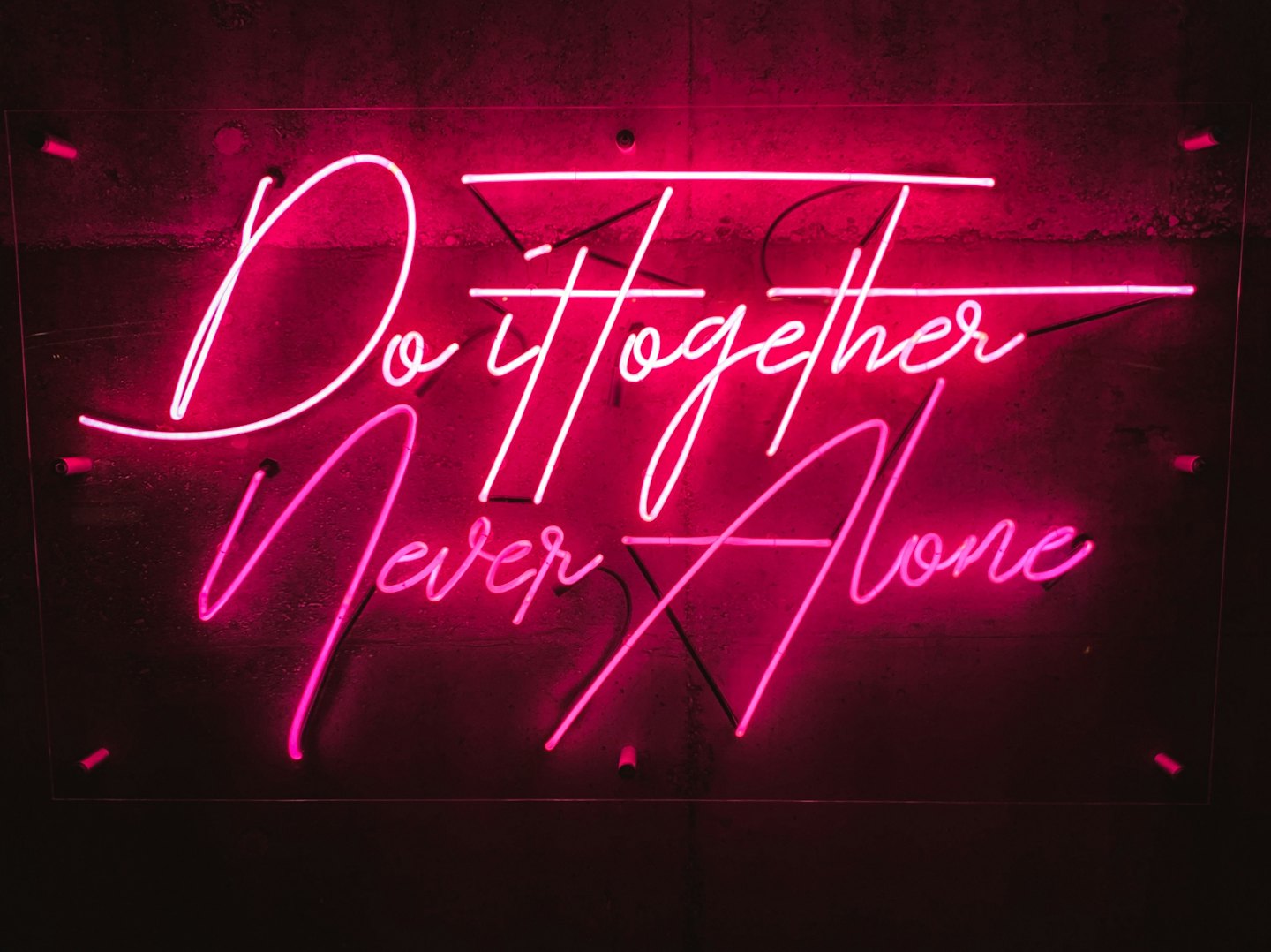 Do It Together Never Alone pink neon sign