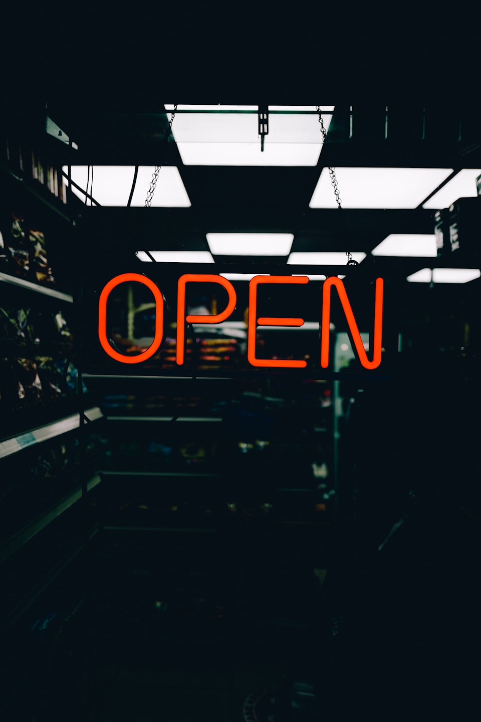 OPEN red neon sign in store