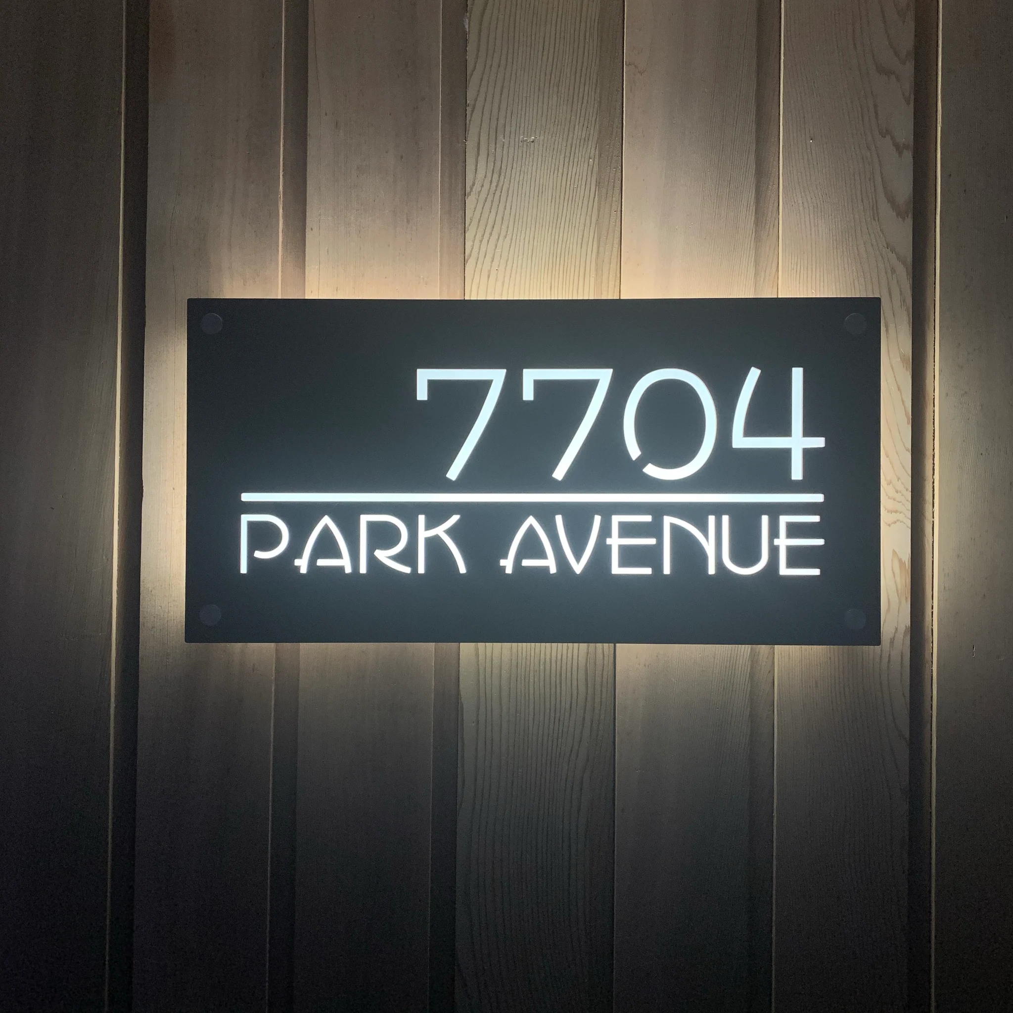 Backlit house number sign